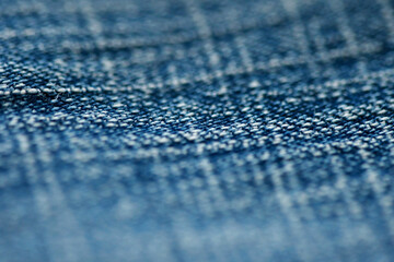 Jeans denim texture close up , focus only one point , soft blured background wallpaper