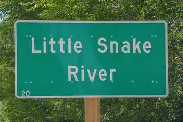 The sign for the Little Snake River in the Rocky Mountains of Wyoming