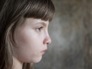 Teen girl playing nurse medicine. child is wearing white medical gown