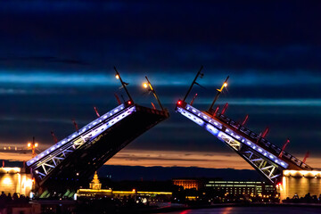 Fototapeta na wymiar Opening of Palace drawbridge. Night view of Palace bridge from the Neva river in Saint Petersburg, Russia