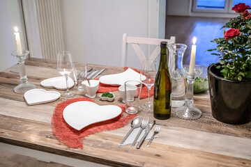 Valentines day dinner setting romantic love for two wooden table red heart shape candle light with roses
