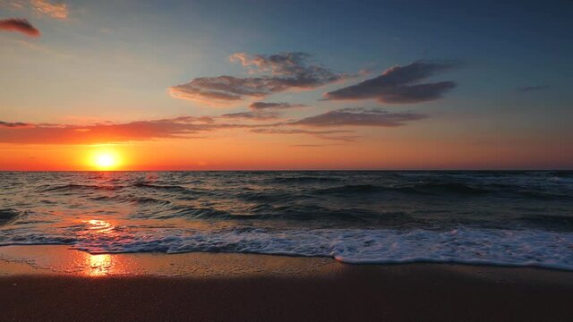 Sea sunrise over tropical exotic beach coast