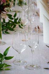 Two clean glasses on the table during the celebration.