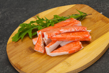 Crab stick surimi over board