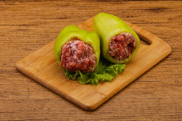 Raw stuffed bell pepper with meat