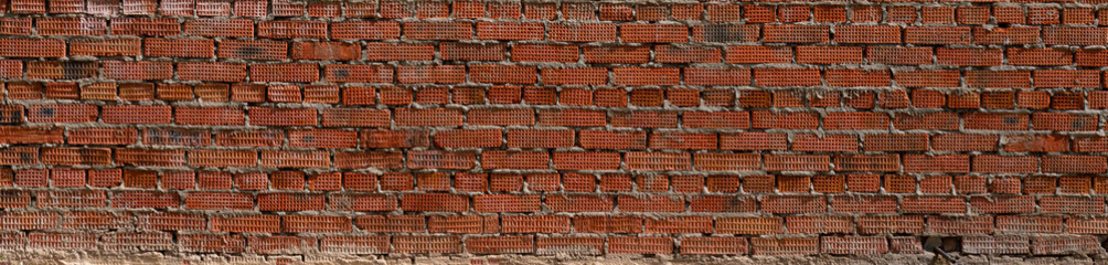 large panorama of the red brick wall