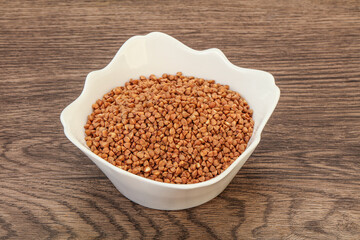 Raw buсkwheat cereal in the bowl