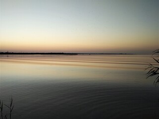 Fototapeta premium Water surface in the evening on the estuary