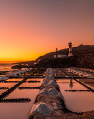 Sunset at the Fuencaliente Lighthouse on the route of the volcanoes south of the island of La...