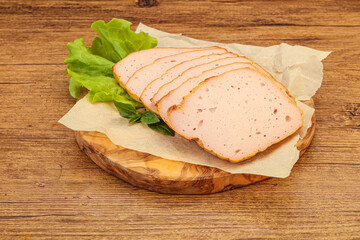 Boiled pork sausage over board