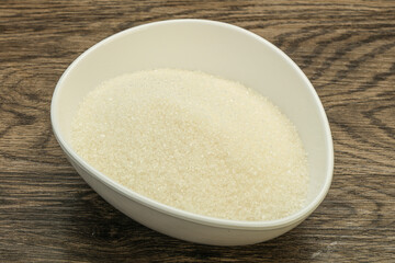White sugar in the bowl