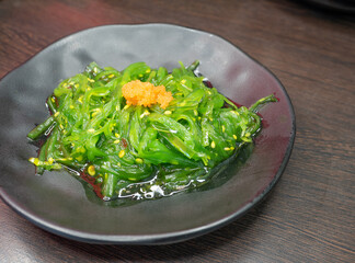 Hiyashi wakame chuka with shrimp eggs, Japanese seaweed with sesame.