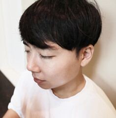 a man with long eyelashes