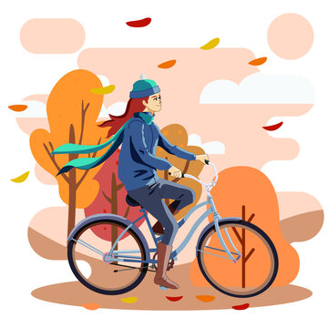 girl riding bike in autumn