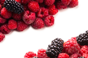 Tasty raspberry and blackberry background.