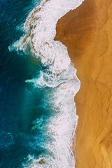 Beautiful sea wave. Clean beach with beautiful yellow sand and turquoise sea, vertical photo....
