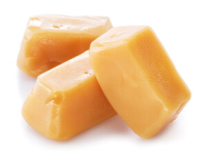 Toffee or candy caramel sweets isolated on white background.