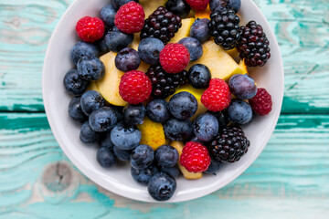 Fresh berries in a bowl. Healthy diet.