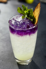 Modern cocktail with pear and ube  sweet potato