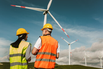 Windmill engineers inspection and progress check wind turbine