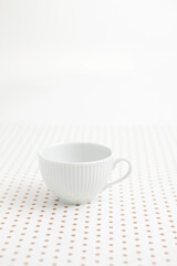 coffee cup on dot pattern paper