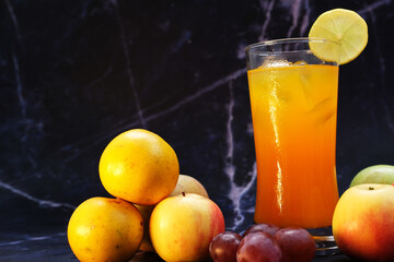 chilled orange juice on table background, summer drinks