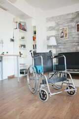 Wheelchair in healthcare room for patients with walking illness. No patient in the room in the private nursing home. Therapy mobility support elderly and disabled walking disability impairment