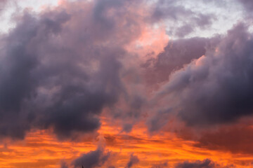 Naklejka na ściany i meble Sunset in the clouds.