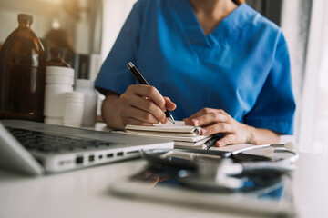 Medicine doctor hand working with modern digital tablet computer interface as medical network...