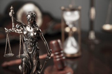 Lawyers office concept. Law symbols composition: Themis sculpture, gavel and scale. - obrazy, fototapety, plakaty