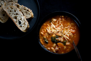 Homemade Ribollita, tuscan bean soup with light rye ciabatta