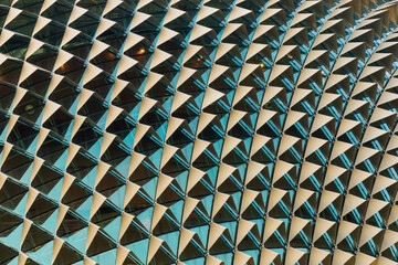 Close up structure pattern in a high rise building with lighting shade