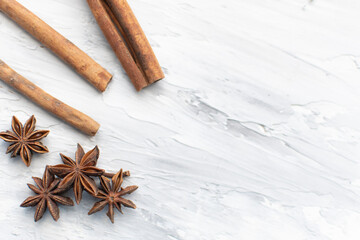 star anise on a white background. this aromatic spice is used for cooking food and various drinks