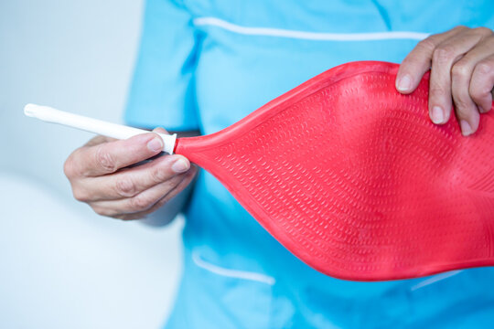 Healthcare - nurse with enema.