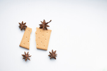 cookies and star anise on a white background. aromatic spices for baking cookies for Christmas