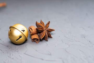 aromatic spice star anise and cinnamon on a gray background. it is used for making mulled wine.