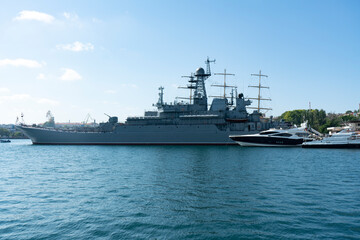 Large warship in the seaport.