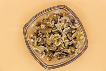 Walnuts in a clear glass tray