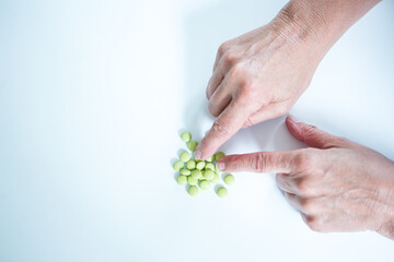 Patient taking pills - herbal medicine.