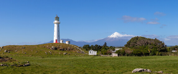 Taranaki volcano and Cape Egmont lighthouse panorama, New Zealand