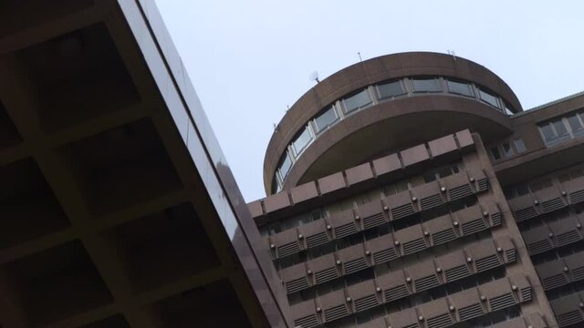 Very low angle of the top of big building on cloudy day.mp4