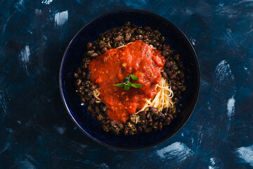 plant-based food, spaghetti with tomato sauce and black beans