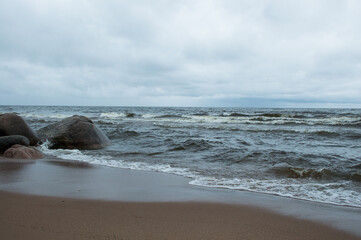 Fototapeta na wymiar sea coast line with big stones