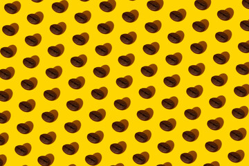 Coffee beans on an orange background.