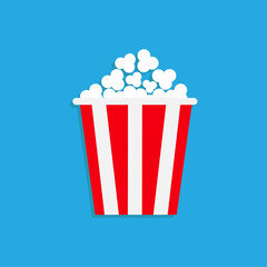 Popcorn icon. Cinema movie night icon. Big size white red strip box. Pop corn food. Flat design style. Blue background. Isolated.