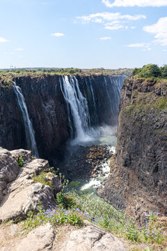Victoria Falls is a waterfall on the Zambezi River on the border between Zambia and Zimbabwe and is considered to be one of the world's largest. Extreme weather conditions are threatening its existenc © Travelvolo