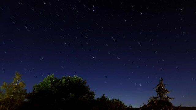 Night sky stars trails time lapse