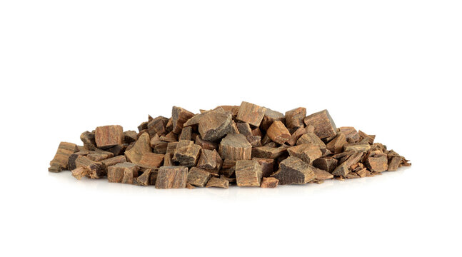Guaiacum herb bark used in natural herbal medicine on white background. Guaiacum officinale. Used to heal rheumatism, arthritis, syphilis, breathing problems, skin disorders & is anti bacterial.