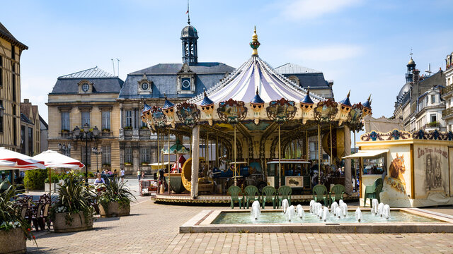 TROYES, FRANCE - JUNE 29, 2010: carousel on front of Town Hall on square Place Marechal Foch in Troyes. Troyes city is the capital of Aube department in Champagne region of Northern France