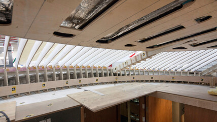 Wheelhouse under constrction. Interior of a super sailing yacht.  Shipyard. Shipbuilding industry. Yacht builders. Casco. Panorama.  © A